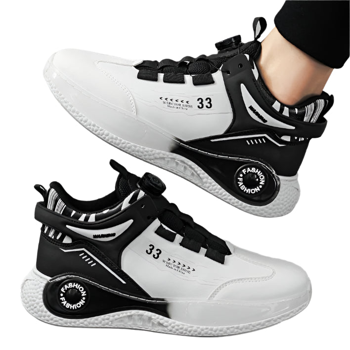 Black and white sneakers with '33' branding on a light gray background