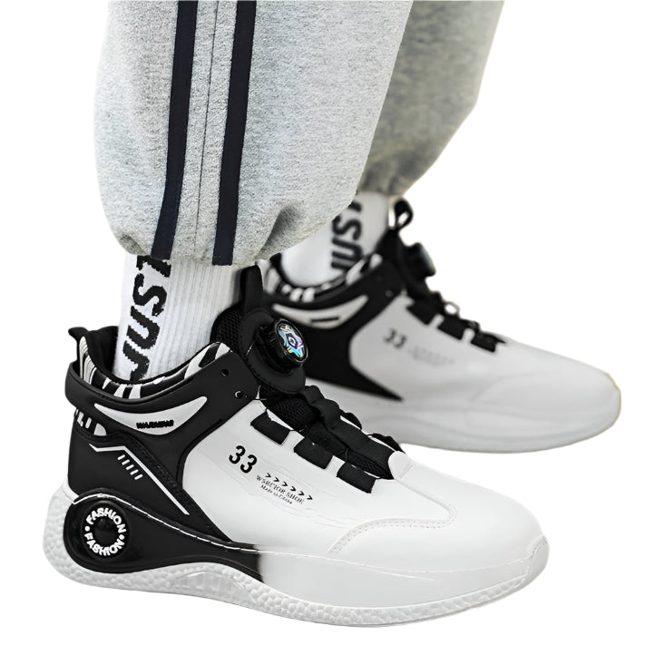 Black and white sneakers with 'JUST DO IT' on a light gray background