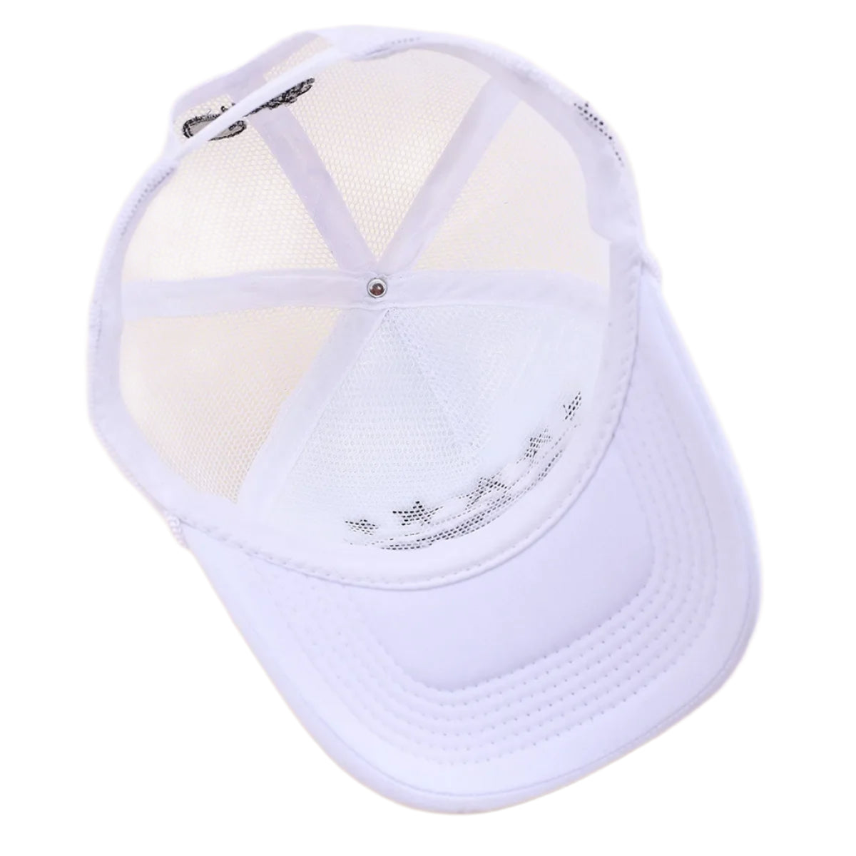 White baseball cap with mesh back on a beige background