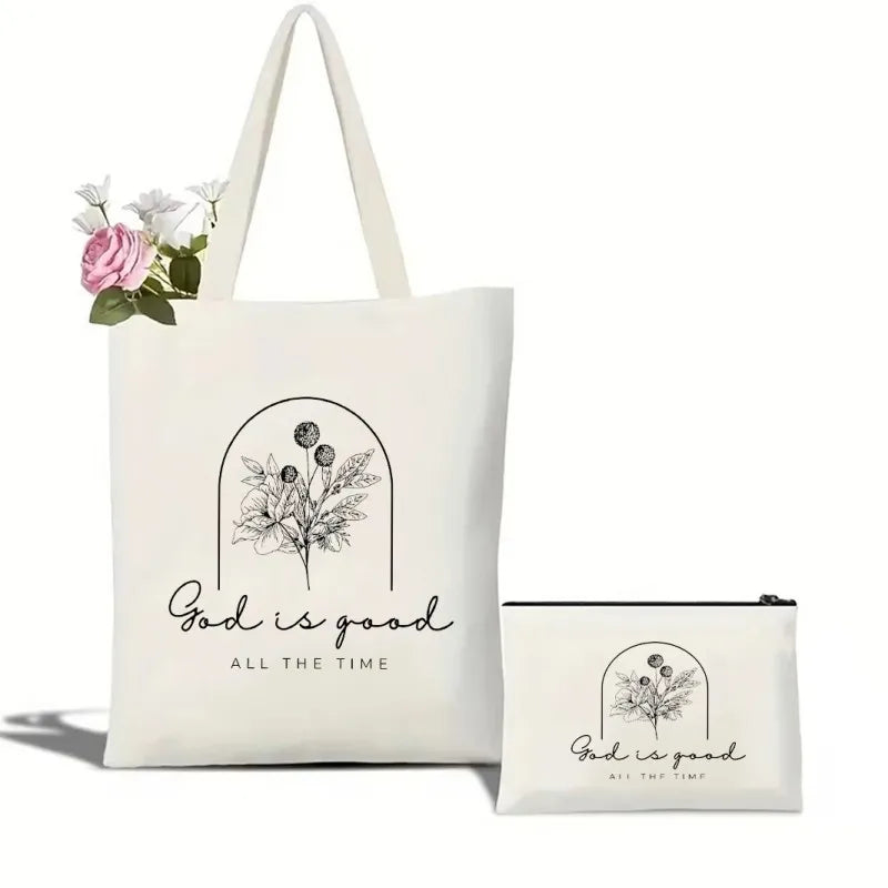 Tote bag and pouch set with floral design and 'God is good, all the time' text on a white background