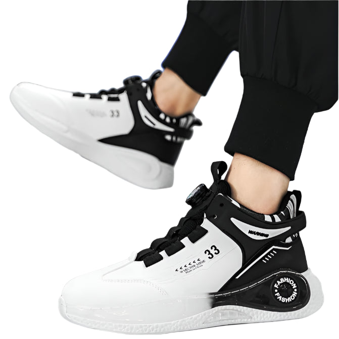 White and black sneakers with brand logo on a reflective surface