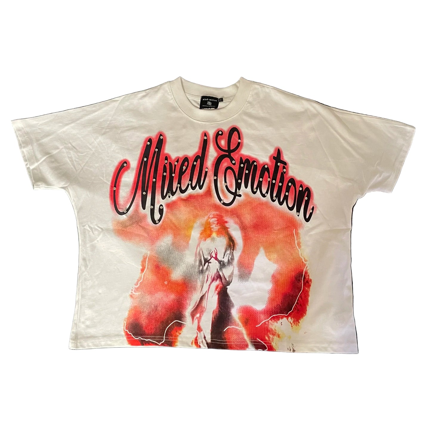 White t-shirt with 'Mixed Emotion' graphic design on a dark fabric background