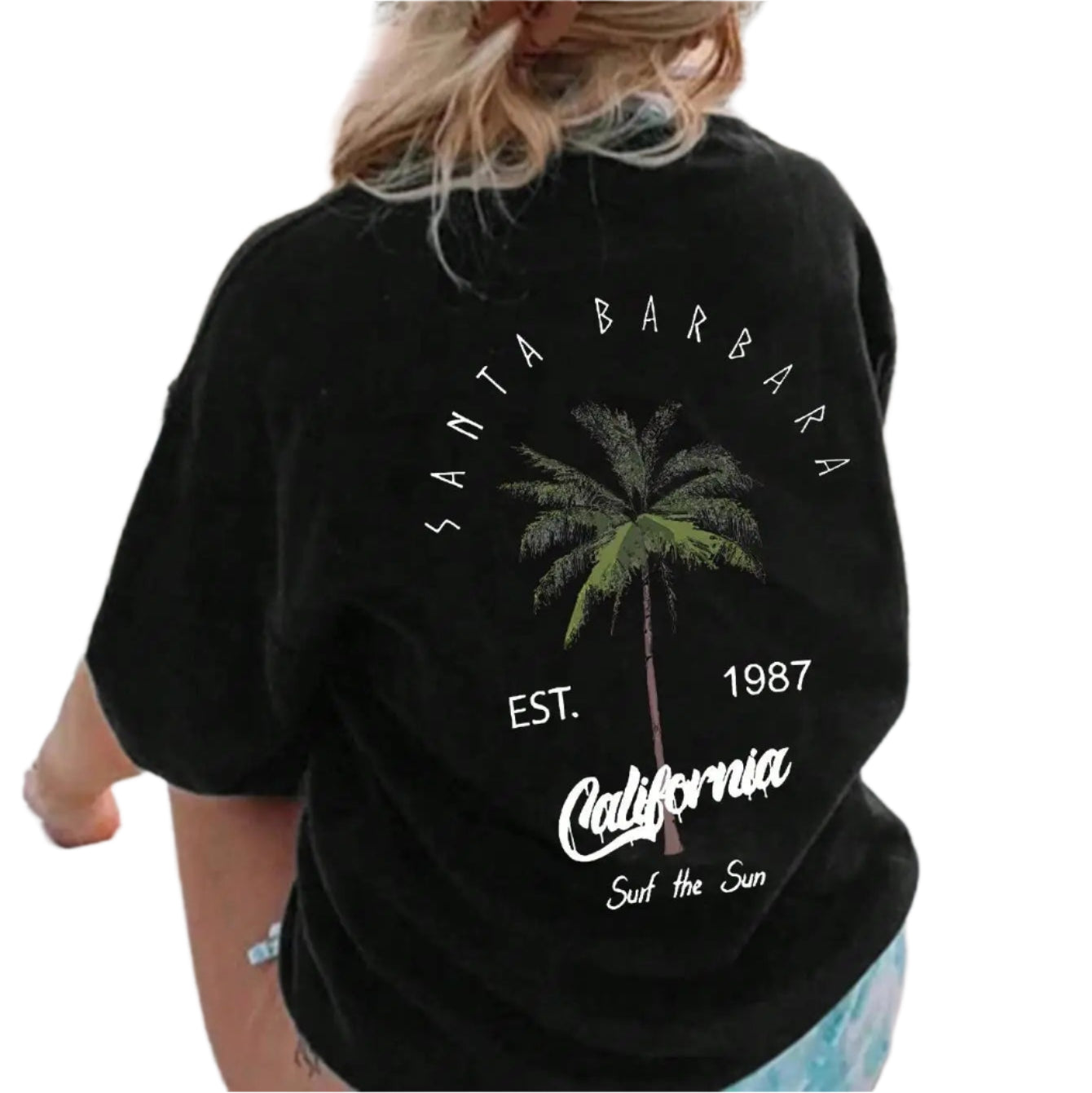 Person wearing a black t-shirt with 'Santa Barbara, California' text and palm tree graphic, standing on a boat.