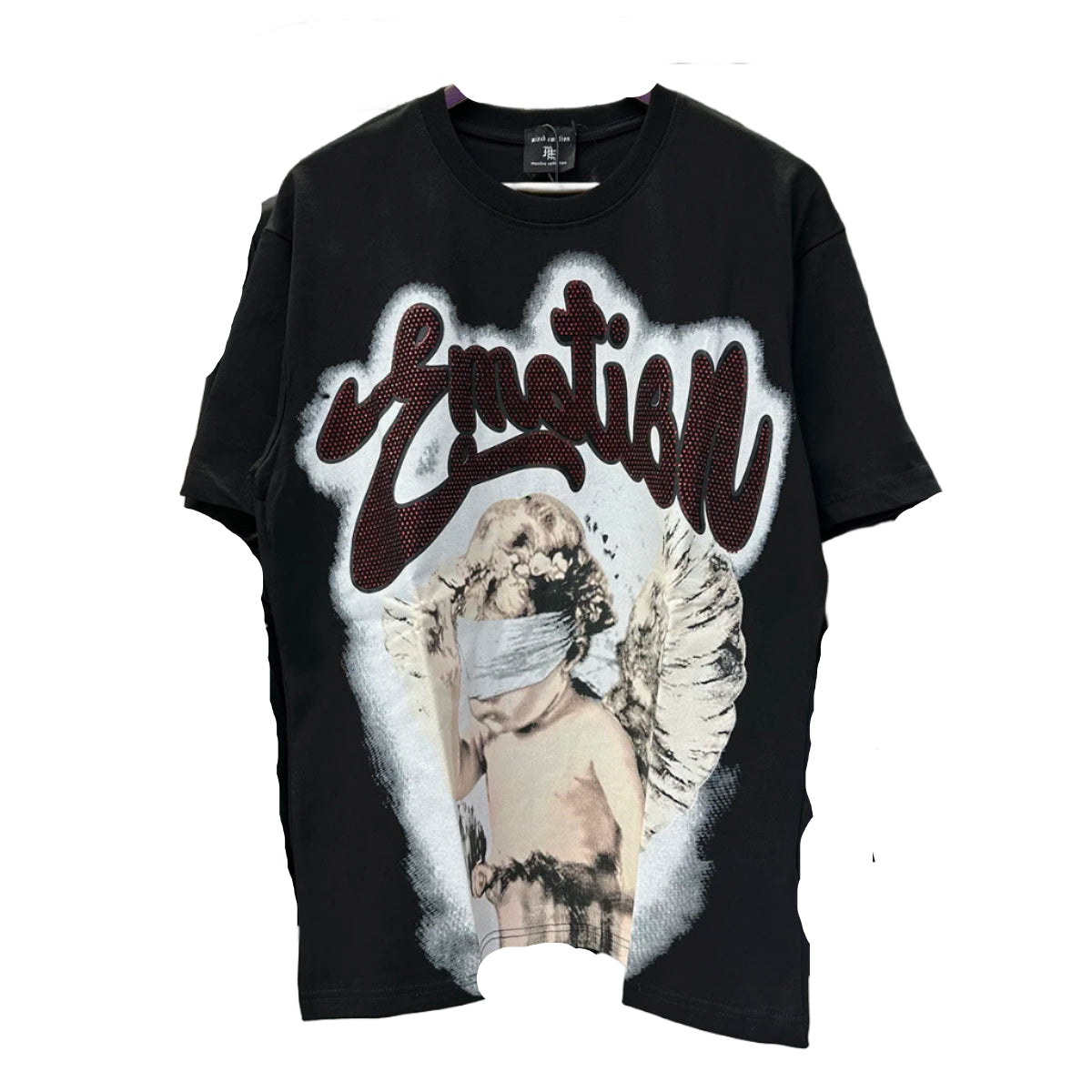 Black t-shirt with graphic design of a person with wings and text 'Emotion' hanging on a rack with other clothes.