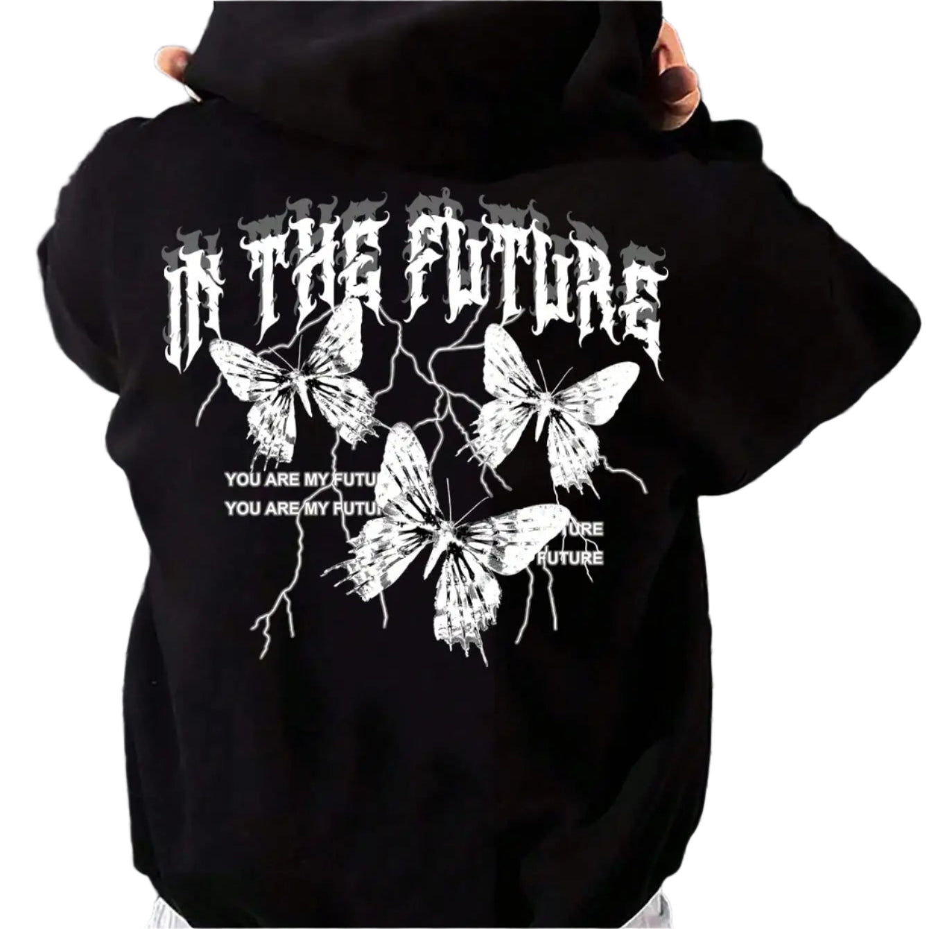 Person wearing a black hoodie with butterfly design and text on the back, standing against a metallic shutter.