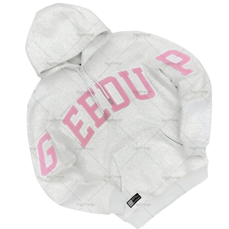 White quilted jacket with pink text on a gray textured background