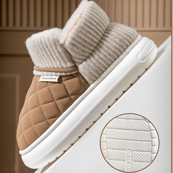 Pair of brown and beige shoes with an anti-slip sole on a beige background