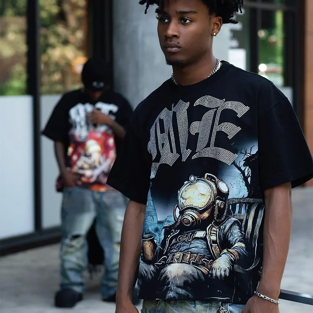 Person wearing a black graphic t-shirt with a design of a person in a gas mask and helmet.