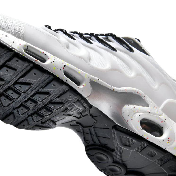Close-up of a white and black shoe sole with textured pattern