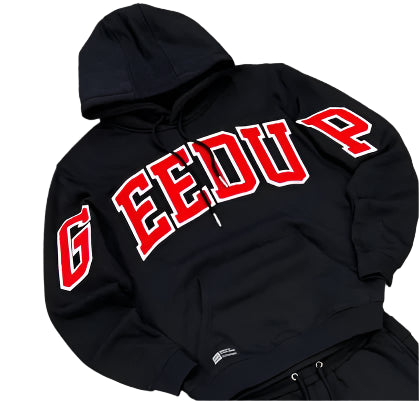 Black hoodie with red and white text on a gray surface