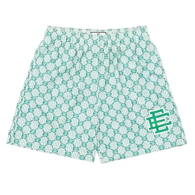 Green and white patterned shorts with a logo on a white background