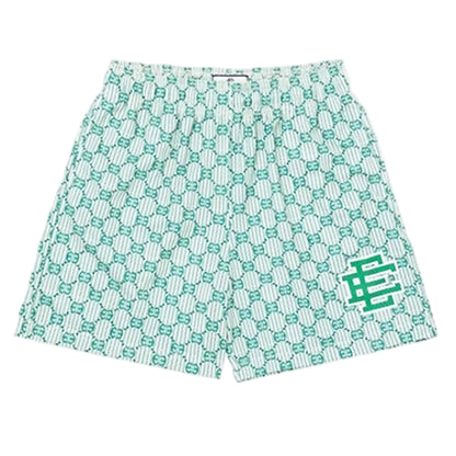 Green and white patterned shorts with a logo on a white background