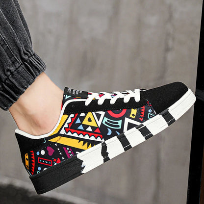 Colorful tribal-patterned sneaker worn by a person with a blurred background