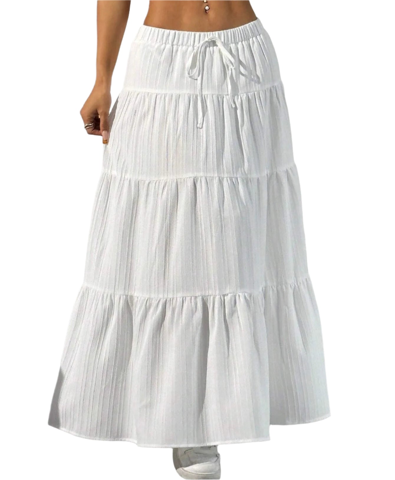 White tiered skirt worn by a person on a neutral background
