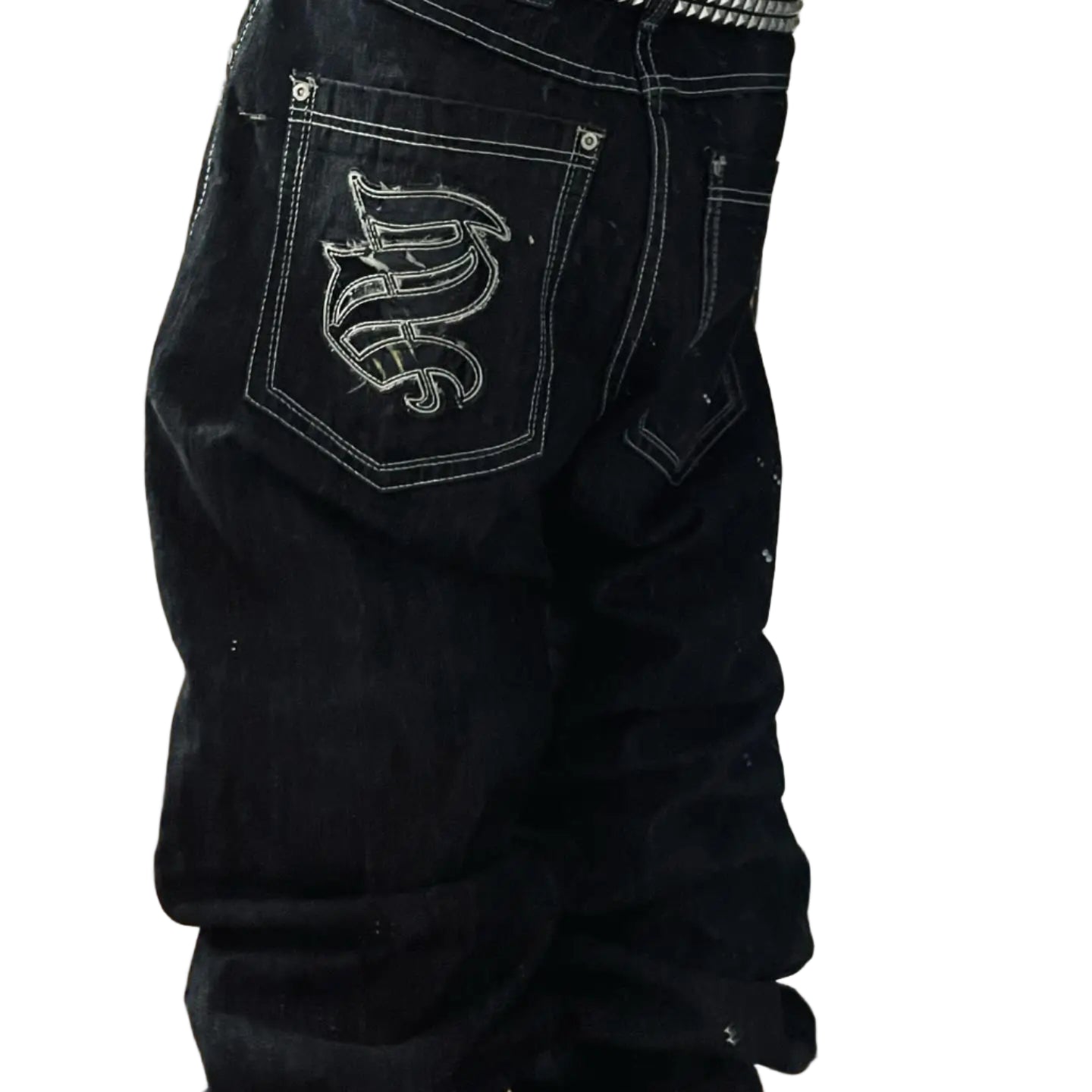 Black pants with a logo on the pocket worn by a person, standing indoors.