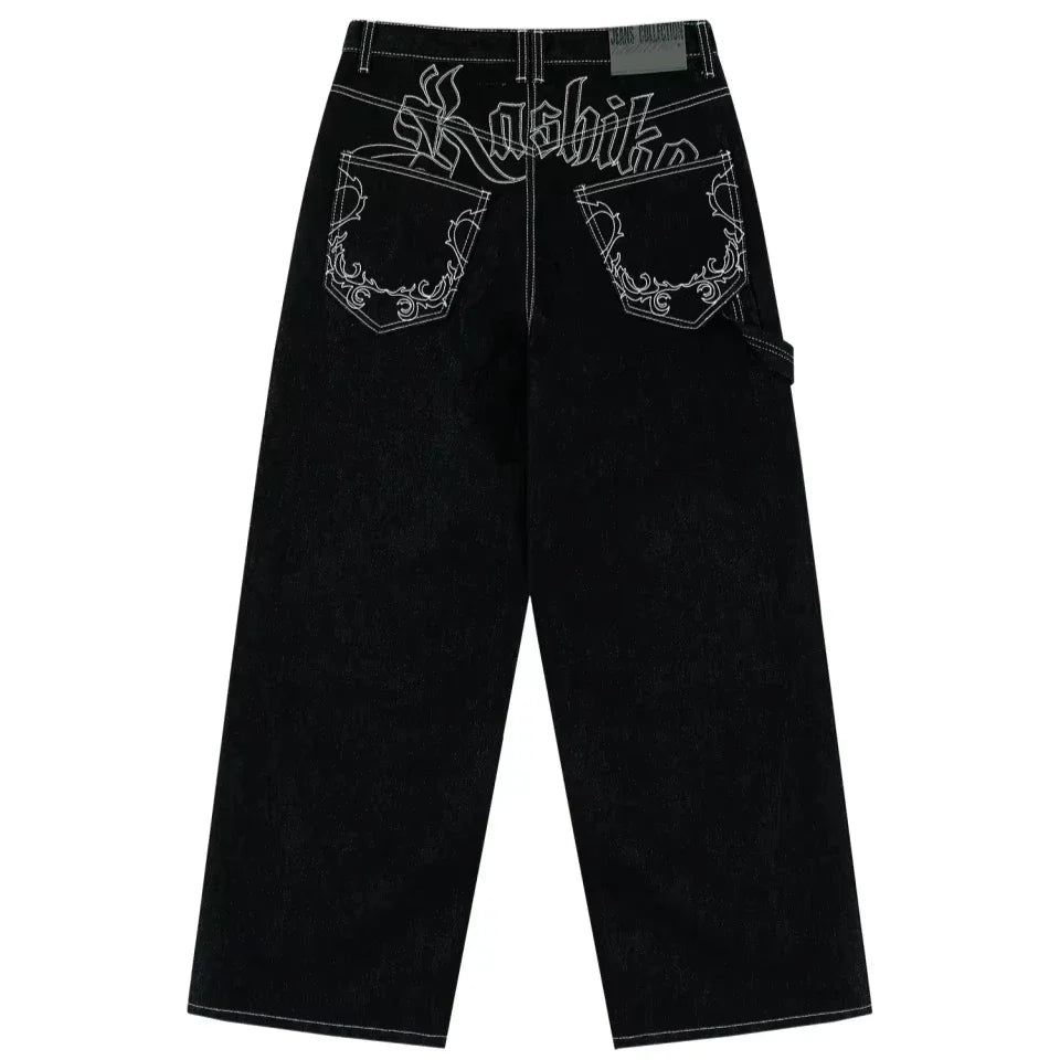 Black jeans with white embroidery on a white background