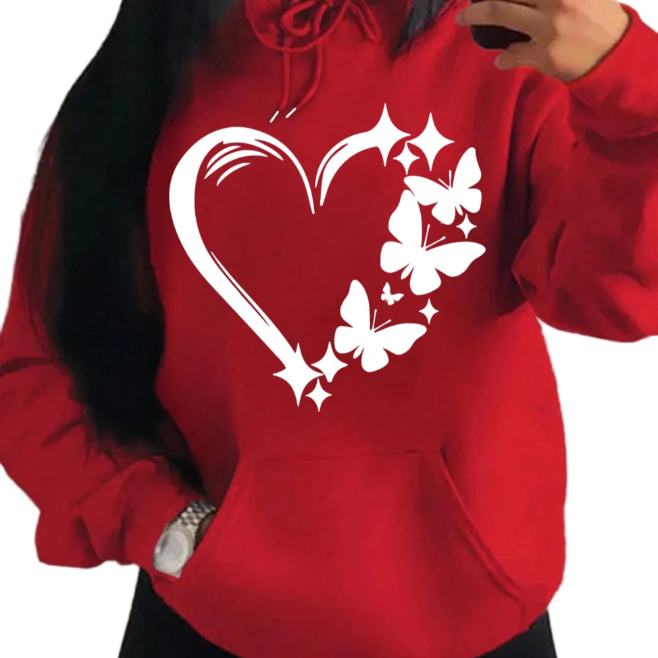 Red hoodie with a heart and butterfly design worn by a person.