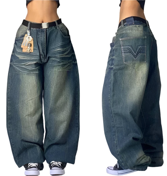 Pair of baggy jeans shown from front and side views on a plain background