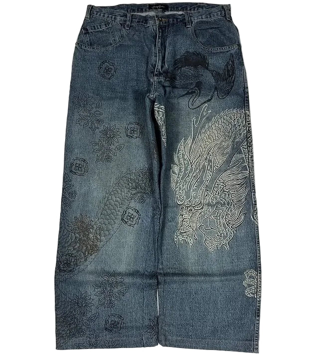 Blue jeans with intricate patterns on a white background