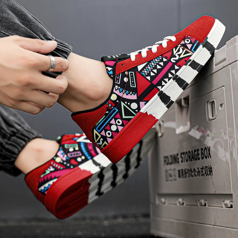 Person wearing red and black patterned sneakers with a storage box in the background