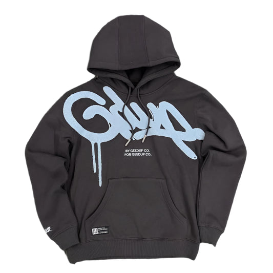 Black hoodie with blue logo on a gray textured background