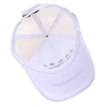 White baseball cap with mesh back on a beige background