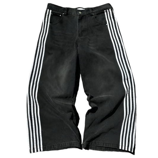 Black pants with white stripes on a light gray background