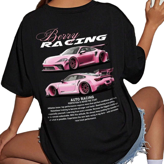 Person wearing a black t-shirt with pink racing car graphics and text.