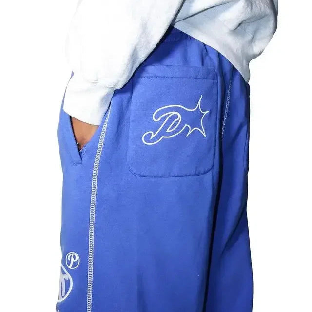 Blue jacket with a logo on the chest against a white background