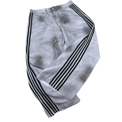 Gray pants with black stripes on a white background