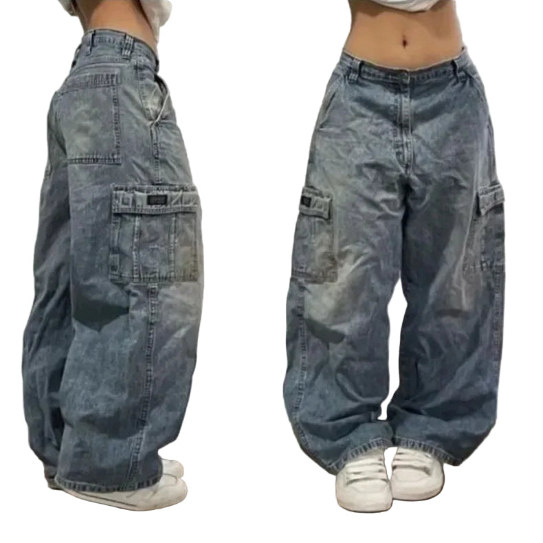 Blue baggy jeans worn by a person on a plain background