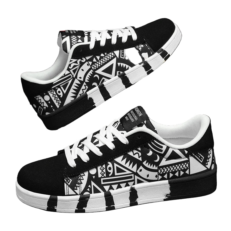 Black and white patterned sneakers with a visible brand logo on a dark background
