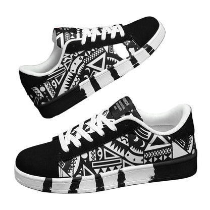 Black and white patterned sneakers with a visible brand logo on a dark background