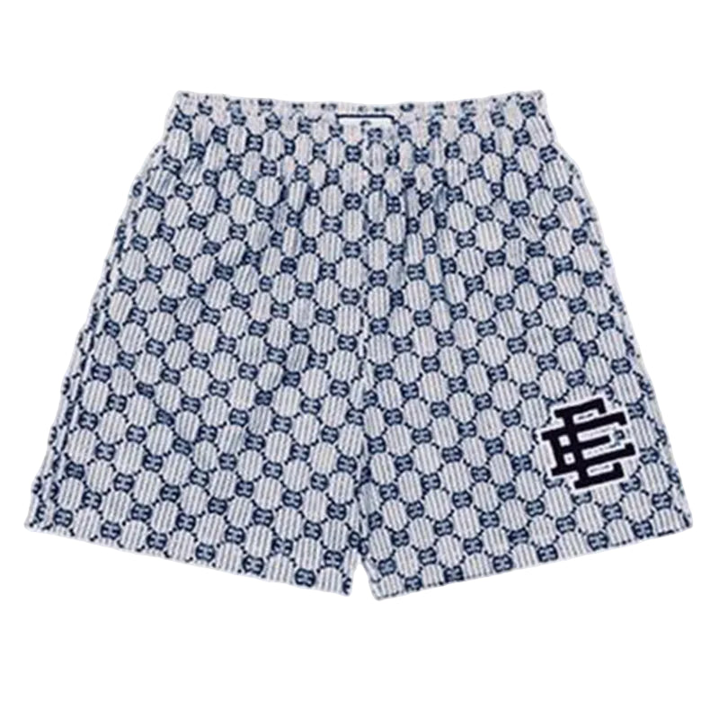 Patterned shorts with a logo on a light gray background