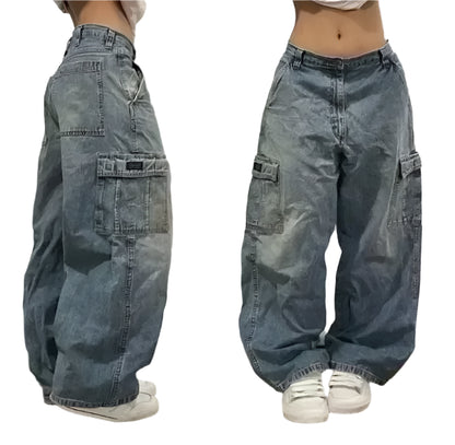 Pair of wide-leg jeans shown from front and side views on a neutral background