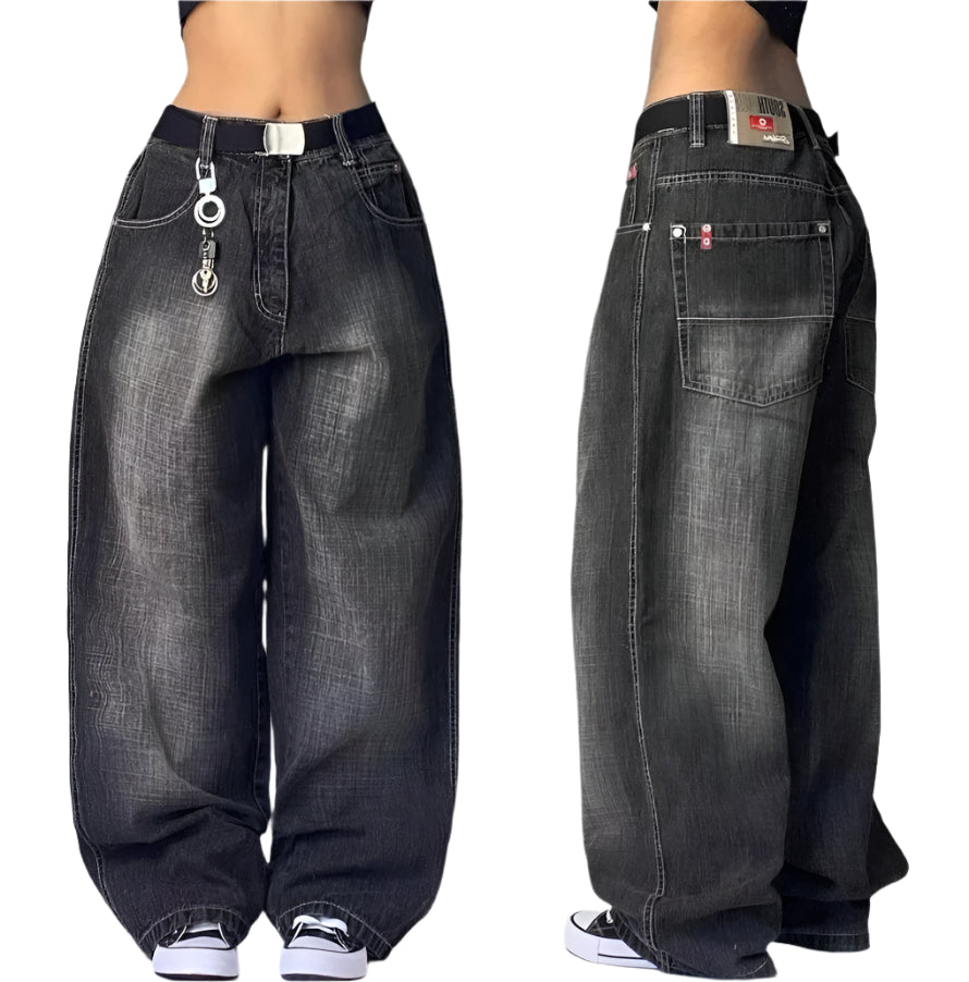 Wide-leg jeans worn by a person on a plain background
