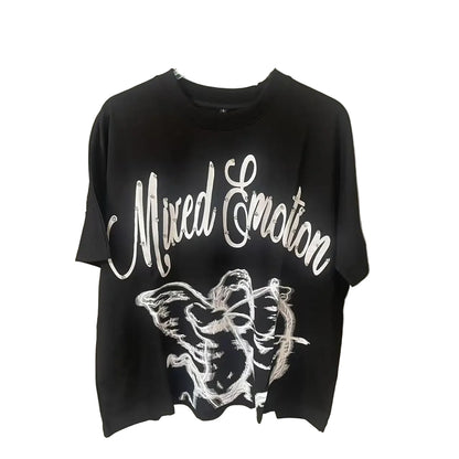 Black t-shirt with 'Mixed Emotion' text and butterfly design on a hanger against a plain background