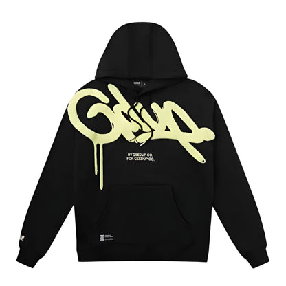 Black hoodie with yellow logo on a gray background
