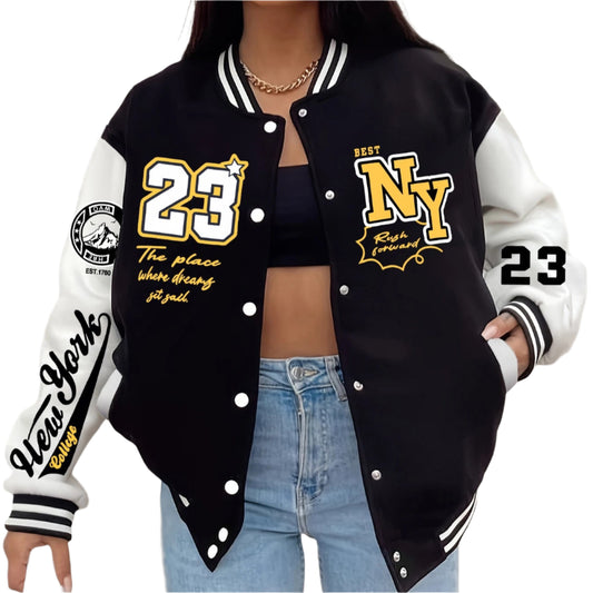 Person wearing a black and white varsity jacket with 'NY' and '23' branding.