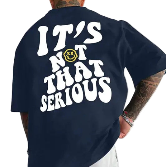 Person wearing a navy blue t-shirt with 'It's not that serious' text on the back.