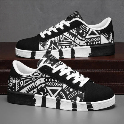 Black and white patterned sneakers on a gray surface with a dark brown wooden shelf in the background.