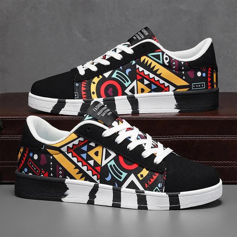 Colorful patterned sneakers with a black and white design on a gray surface.