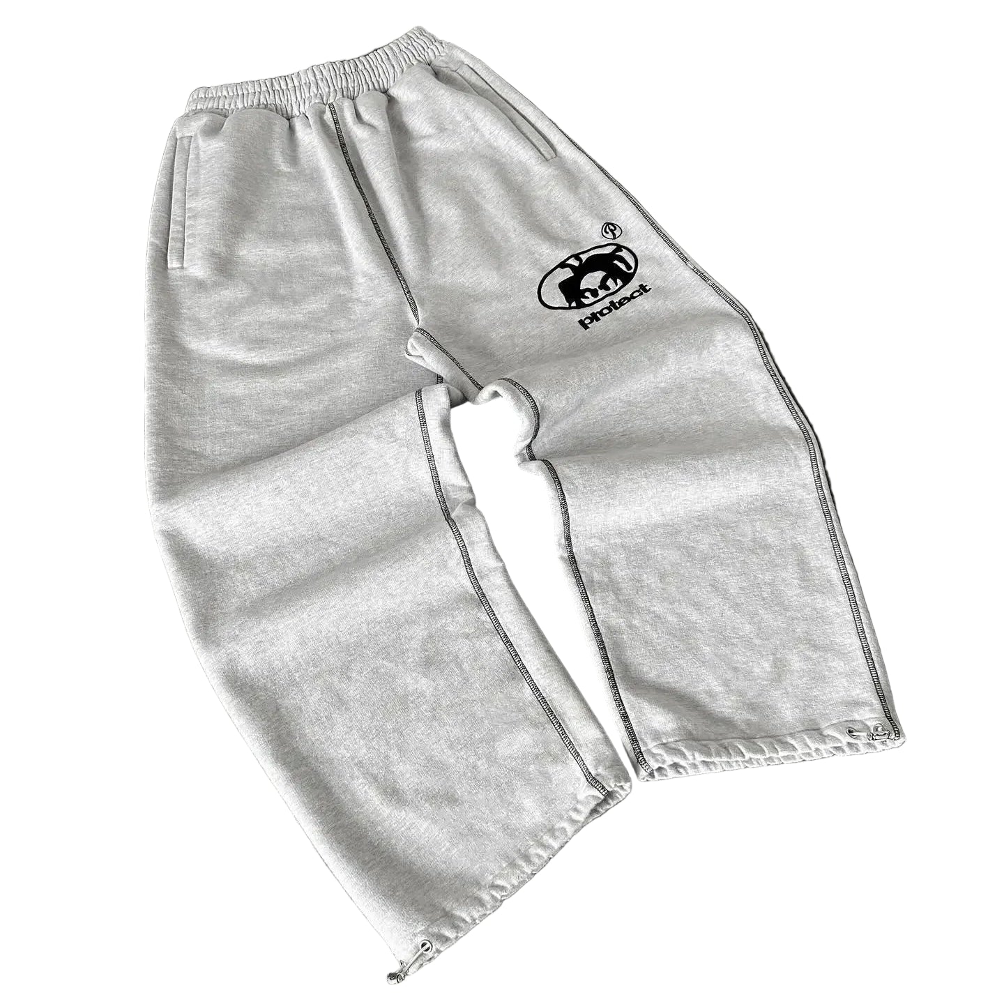 Gray sweatpants with a logo on a dark surface