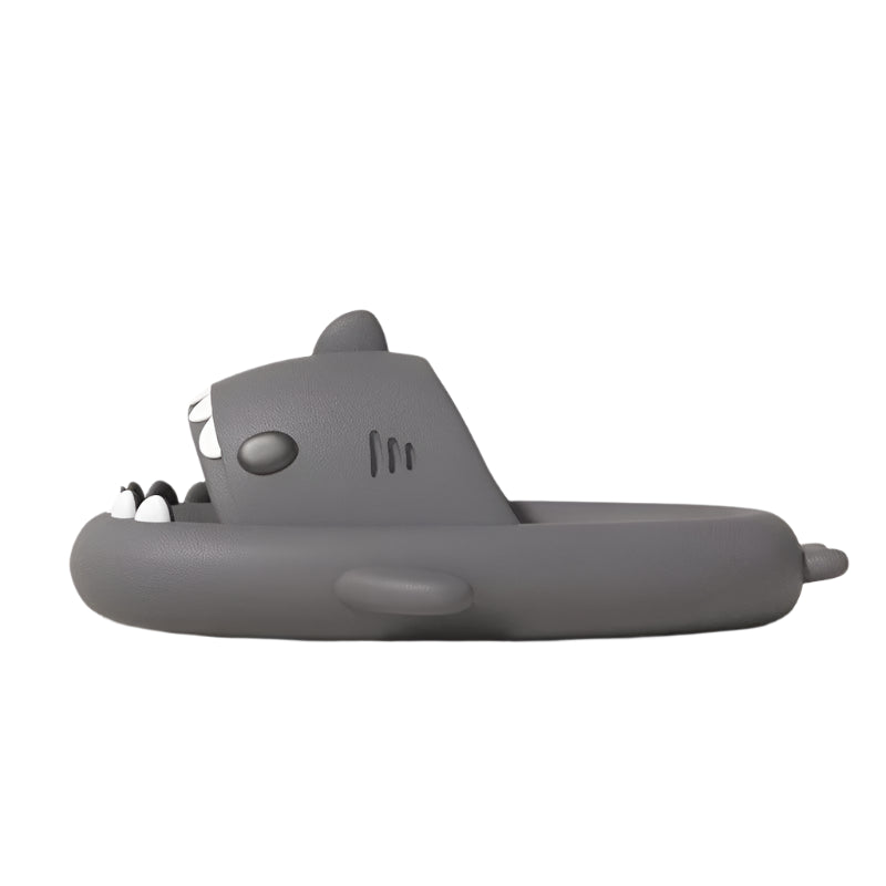 Gray shark-shaped toy on a white background