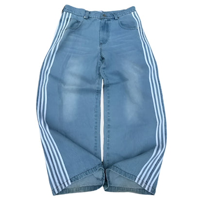 Blue denim shorts with white stripes on a light gray background